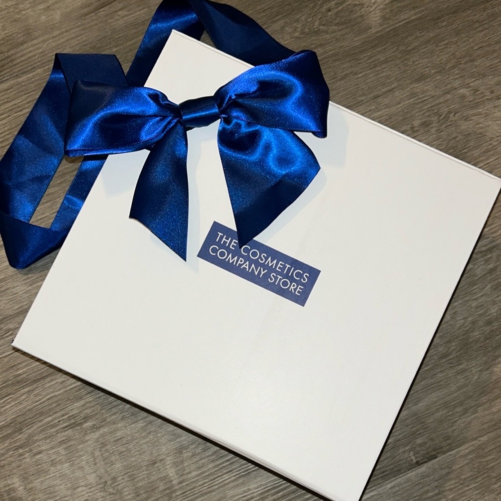 White Gift Box with Blue Ribbon